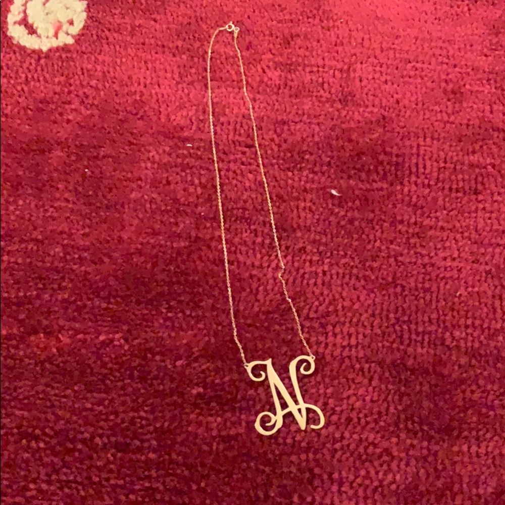 Gold ‘N’ initial necklace.